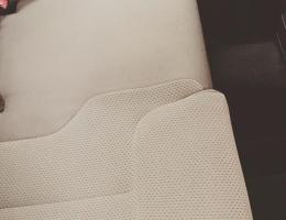 Résultat de la rénovation d'un tissu de siège / Contactez votre centre de lavage auto à Lille